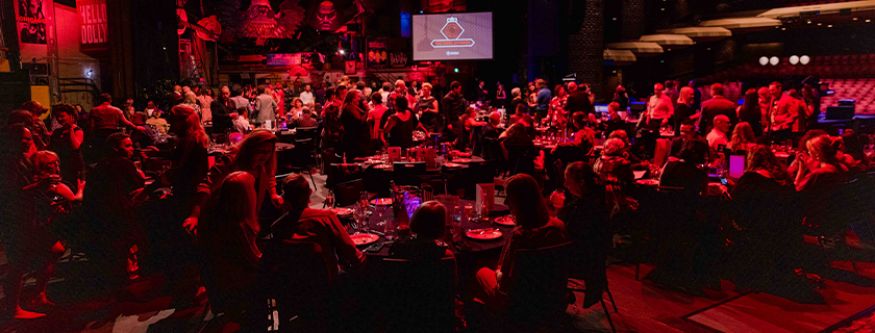 Guests seated on the Adelaide Festival Theatre stage at The Ruby Awards 2023